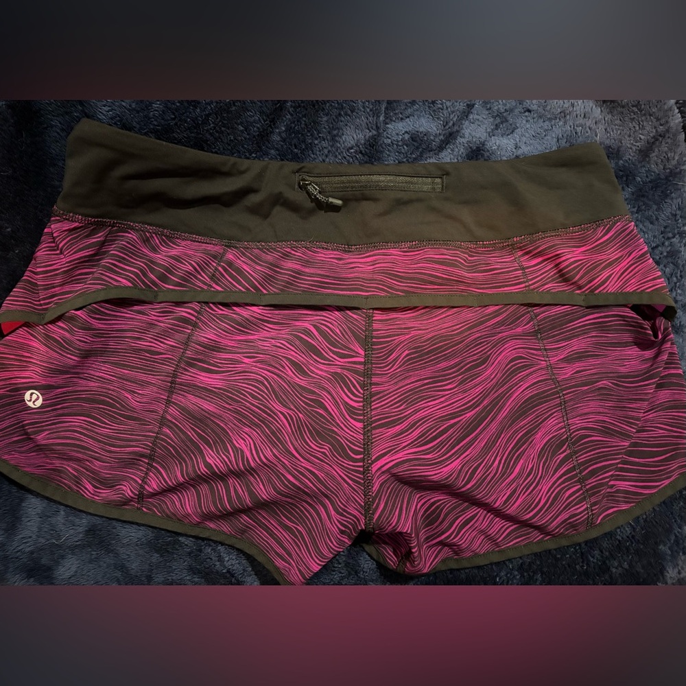 Size 8 lululemon speed run short. 3 inch inseam. EUC. Black & purple striped